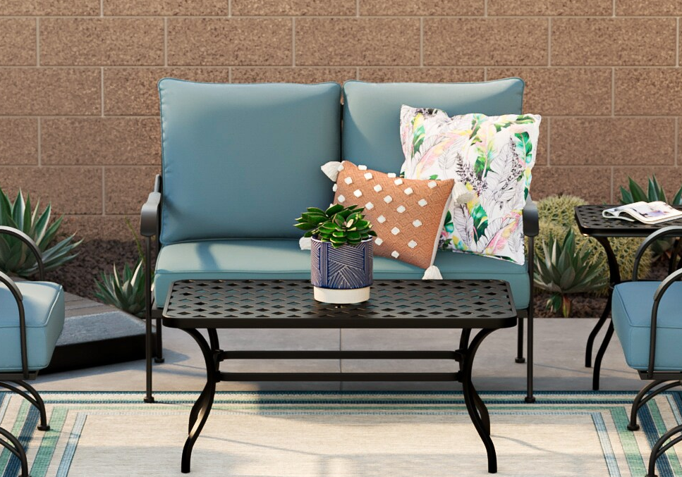 metal patio set with blue cushions