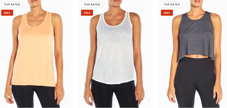 three women wearing tank tops