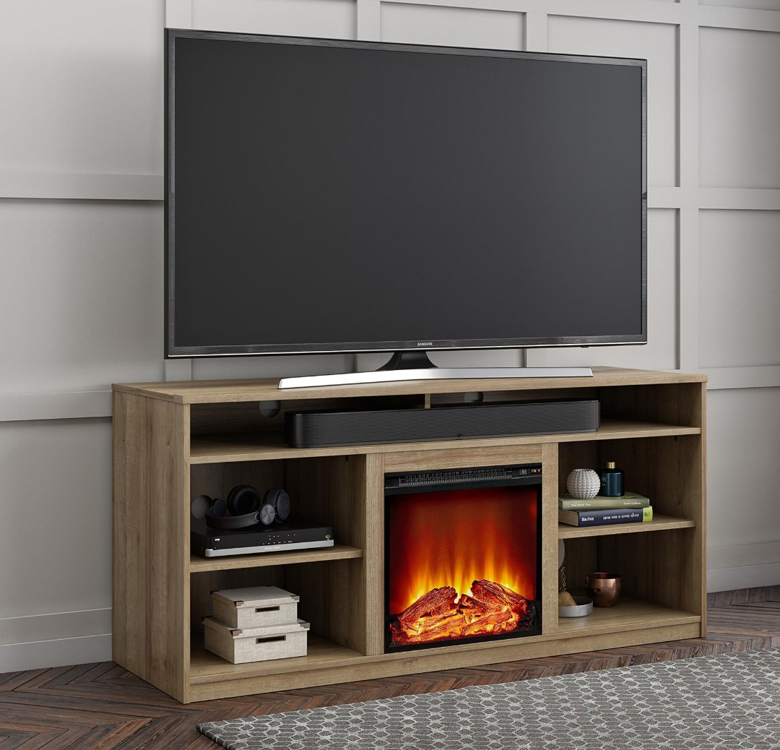 fireplace TV stand with a TV on it