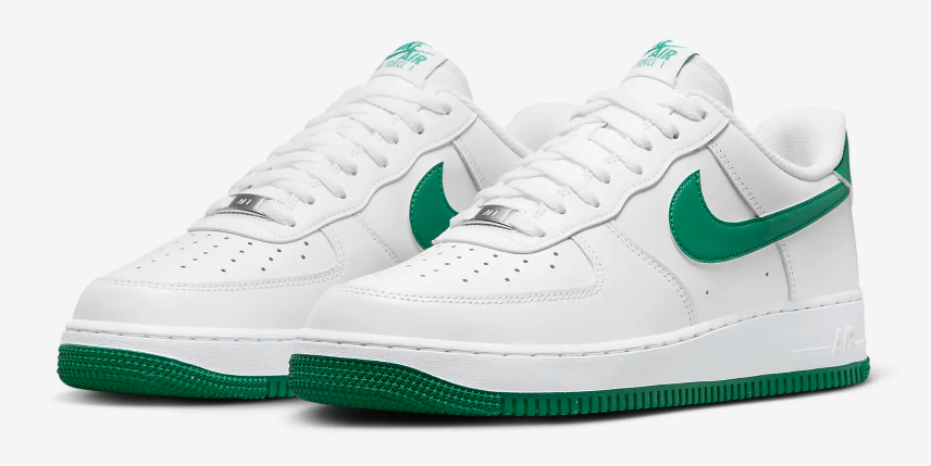Green and white Nike Air Force shoes