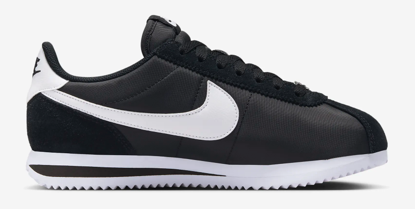 Black and white Nike Cortez shoes