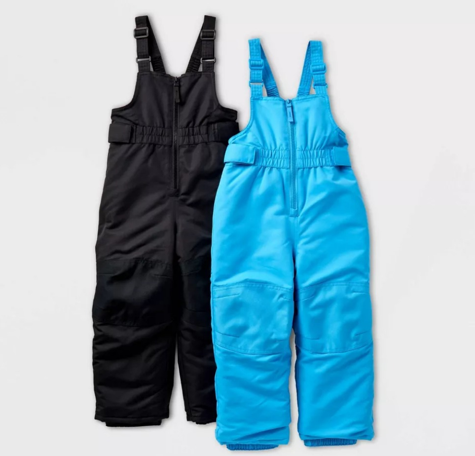 black pair of snow bibs and a blue pair of snow bibs