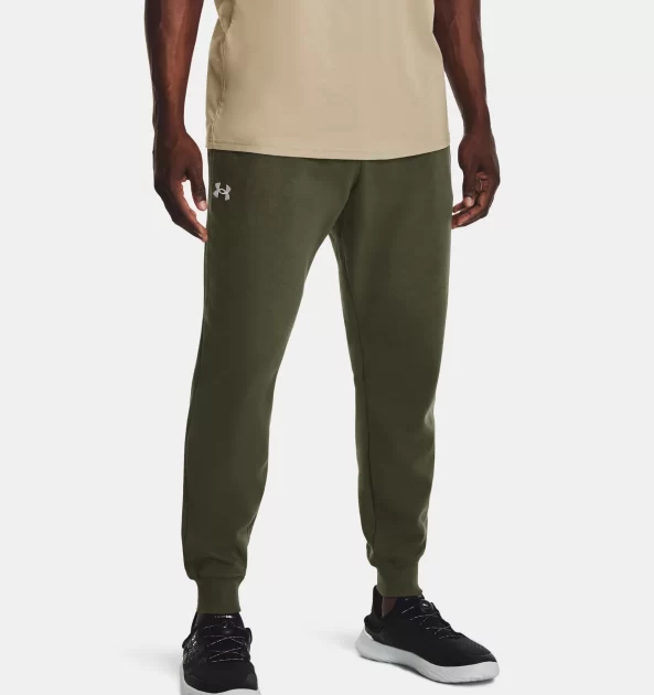 man wearing hunter green under armor joggers