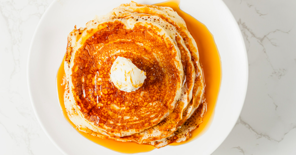 stack on pancakes with butter on top