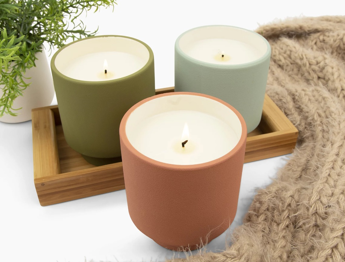 BHG Candles two candles on a tray and one candle in front of the tray