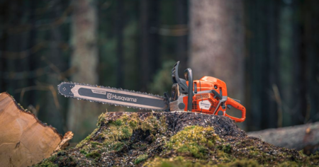 husqvarna chainsaw on a tree stump