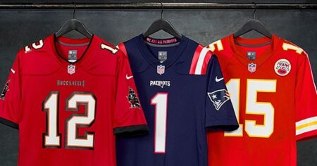 three NFL football jerseys hanging up