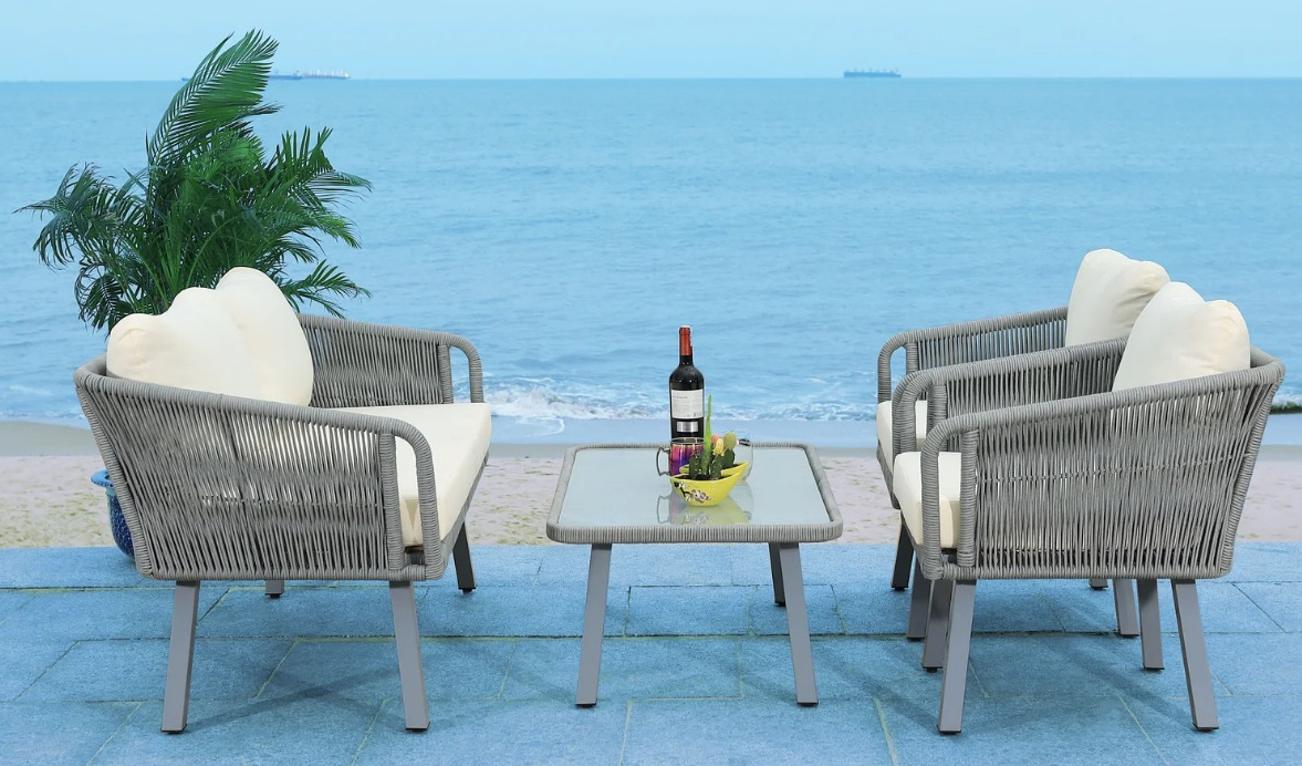 two chairs by the water