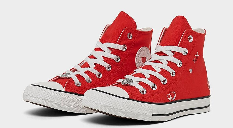 pair of red Converse shoes