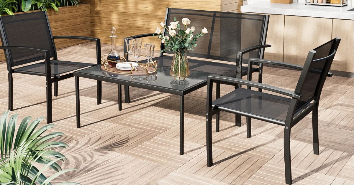 patio set with flowers on the table