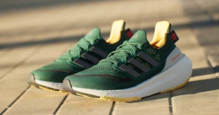 pair of green adidas sneakers