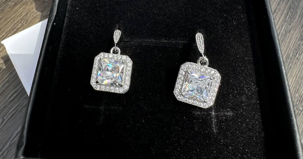 pair of earrings in a black box