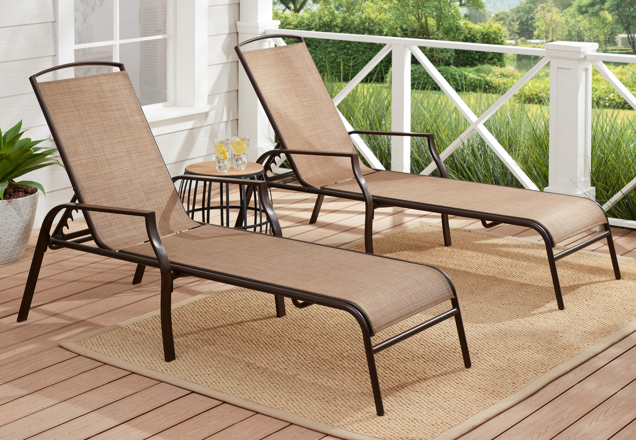 Mainstays Sand Dune Reclining Steel Outdoor Chaise Lounge Set of 2 two lounge chairs on a patio