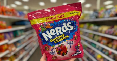hand holding a bag of Nerds Gummy Clusters