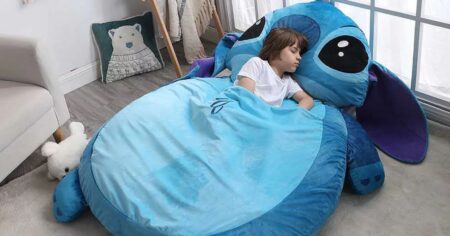 girl laying on a Stitch nap mat