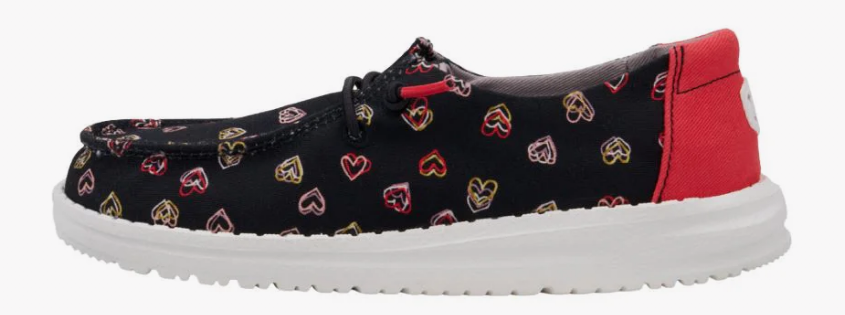 black Hey Dude shoe with hearts on it