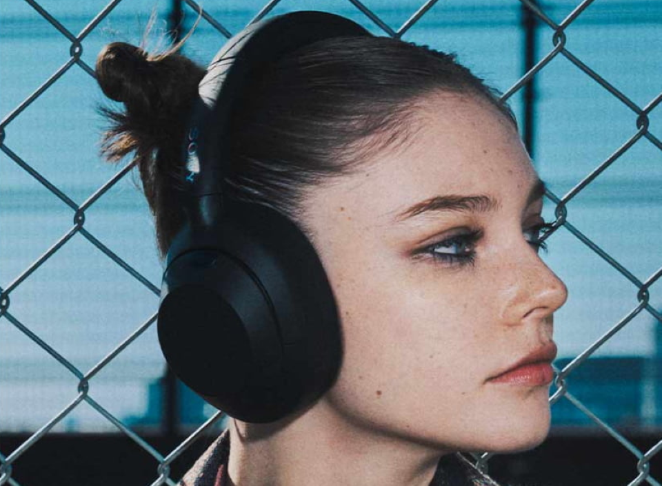 woman wearing Sony headphones