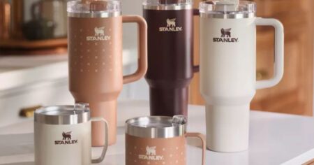 row of Stanley tumblers and mugs