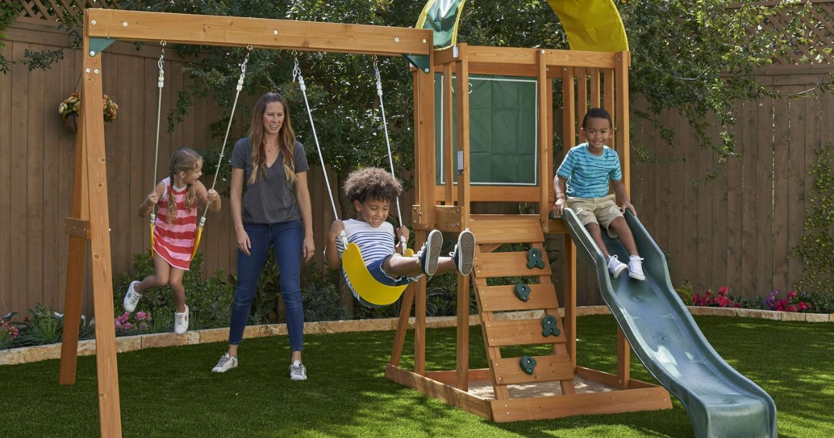 kids playing on a swingset