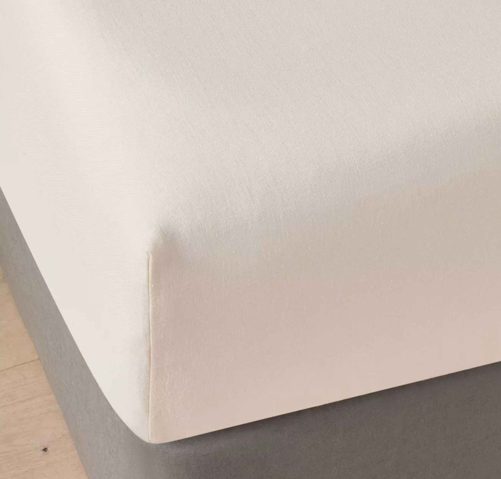 Linen Blend Fitted Sheet Queen sheet on a bed