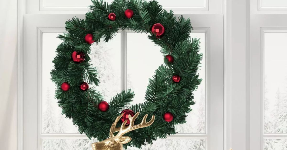 Wondershop Wreath wreath hanging in a window