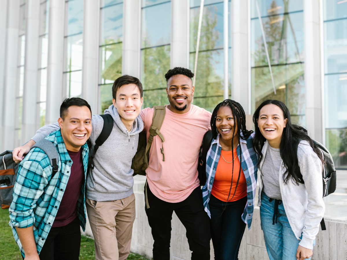 People standing outside a building People standing outside a building