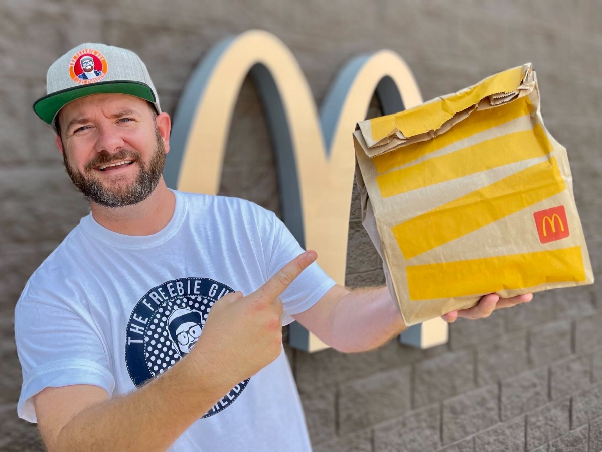 Man holding mcdonald's bag