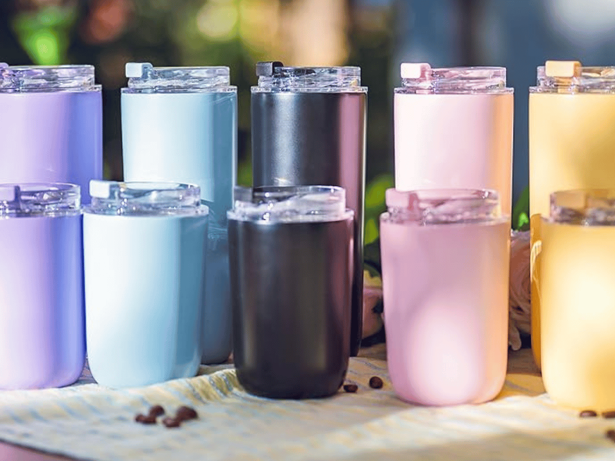 Insulated Tumblers in a row on an outdoor bench